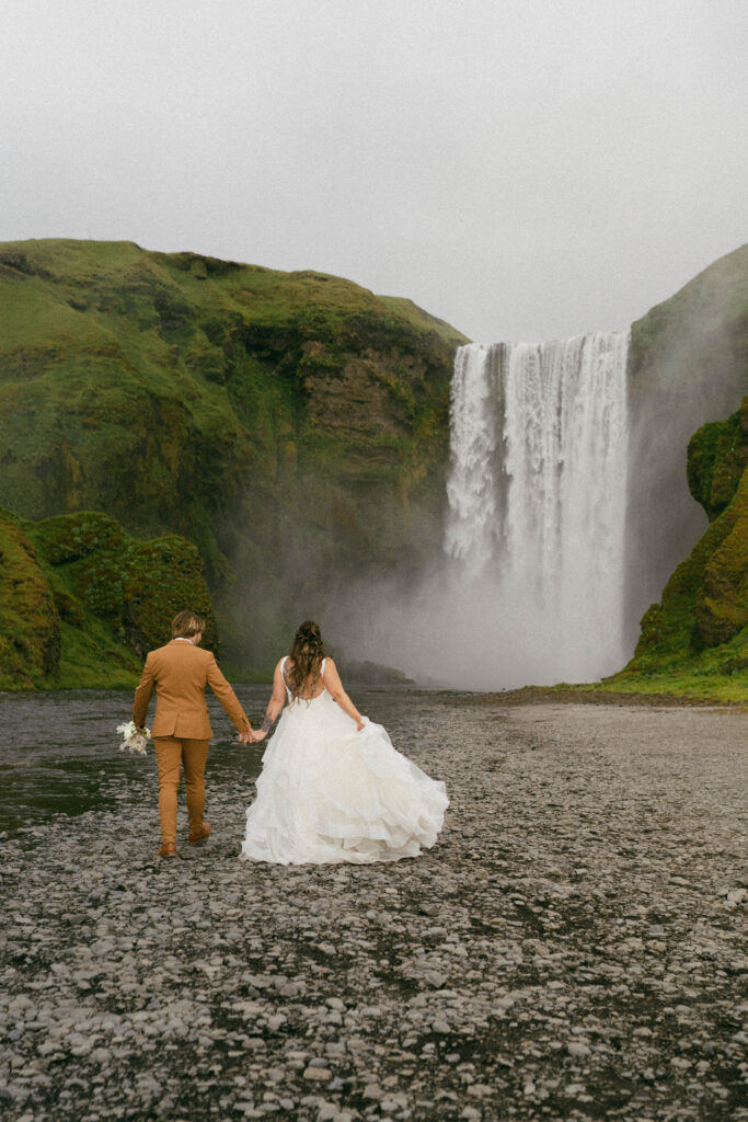 Bride and groom at Iceland Elopement at Skogafoss Waterfall in Iceland