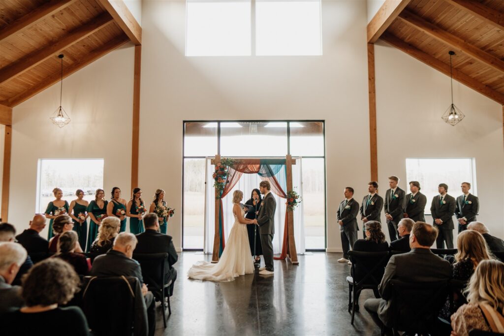 Indoor Ceremony held at Ivy Black Wedding Venue