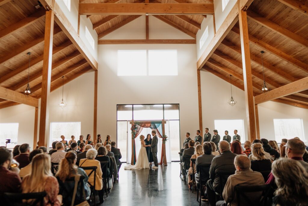 Indoor Ceremony held at Ivy Black Wedding Venue