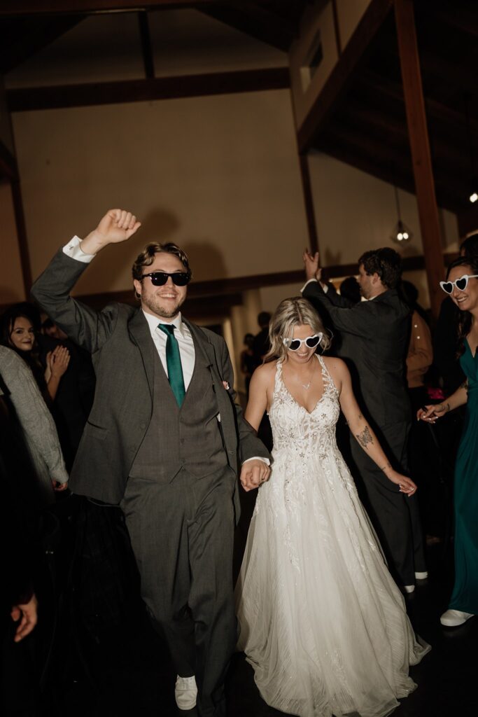 bride and groom grand entrance at ivy black