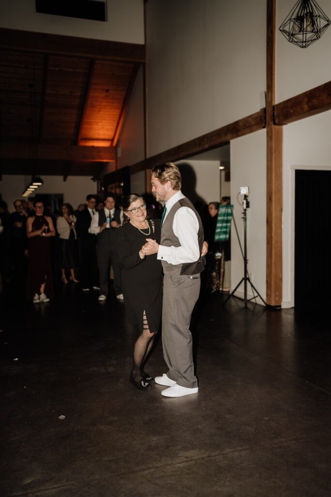 First dance of grooms mother and groom at Ivy Black Wedding venue 