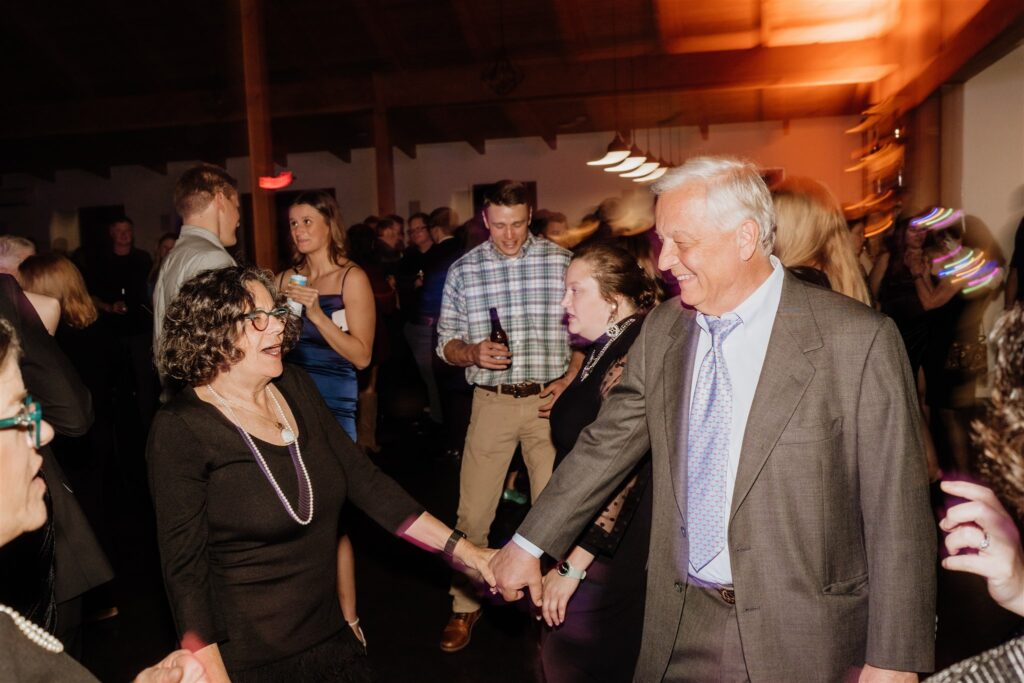 Minneapolis wedding photographers shoot dancing photos at Ivy Black