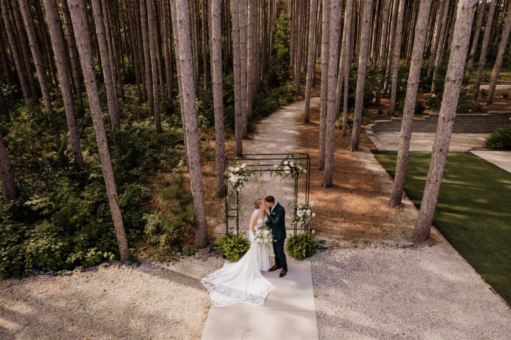 Minneapolis wedding photographer and videographer shoot bride and groom first look photos at pinewood 