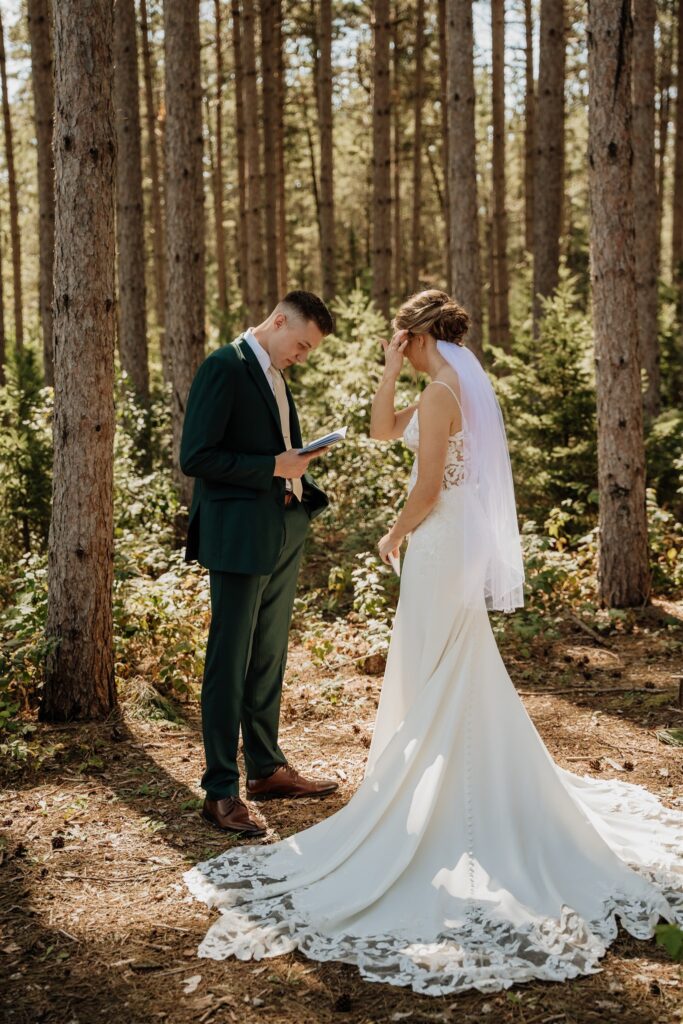 reading vows at pinewood with tall pines in the background