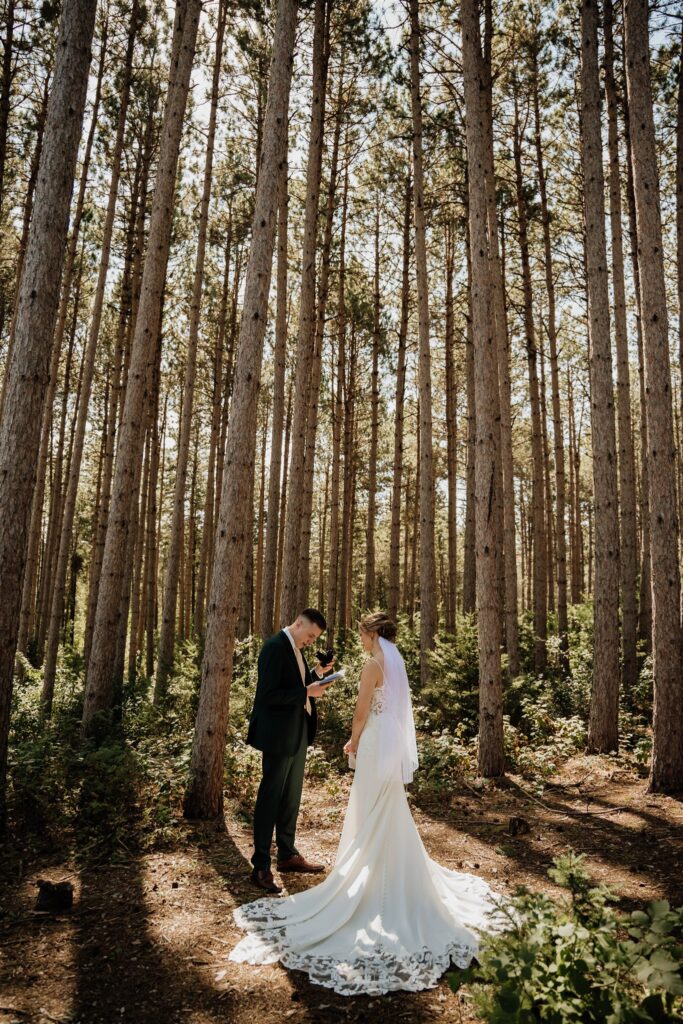 reading vows at pinewood with tall pines in the background