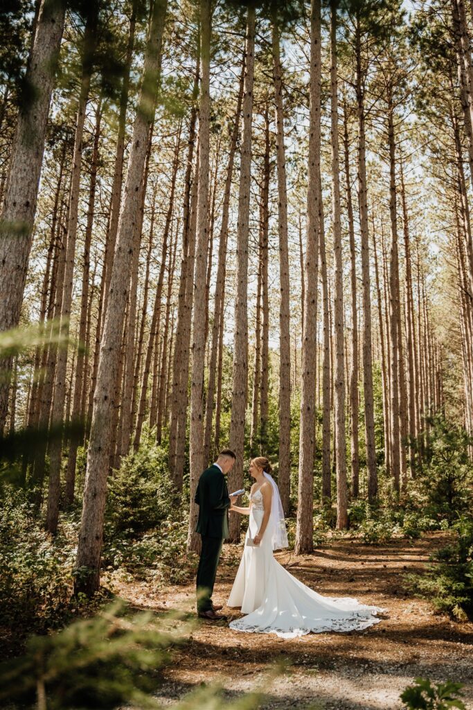 reading vows at pinewood with tall pines in the background