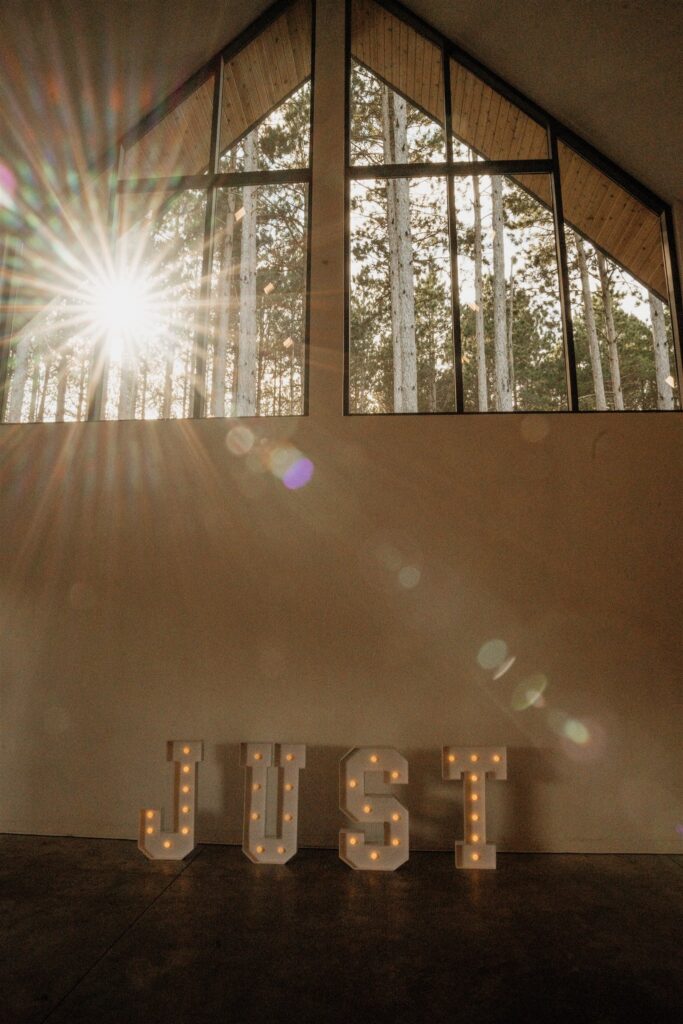 sun beaming in during pinewood wedding reception